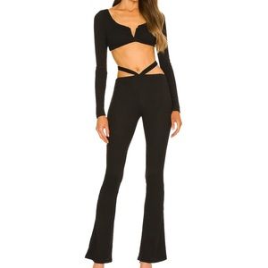 Black and sexy and comfortable Michael Costello jumpsuit worn once. Size S.